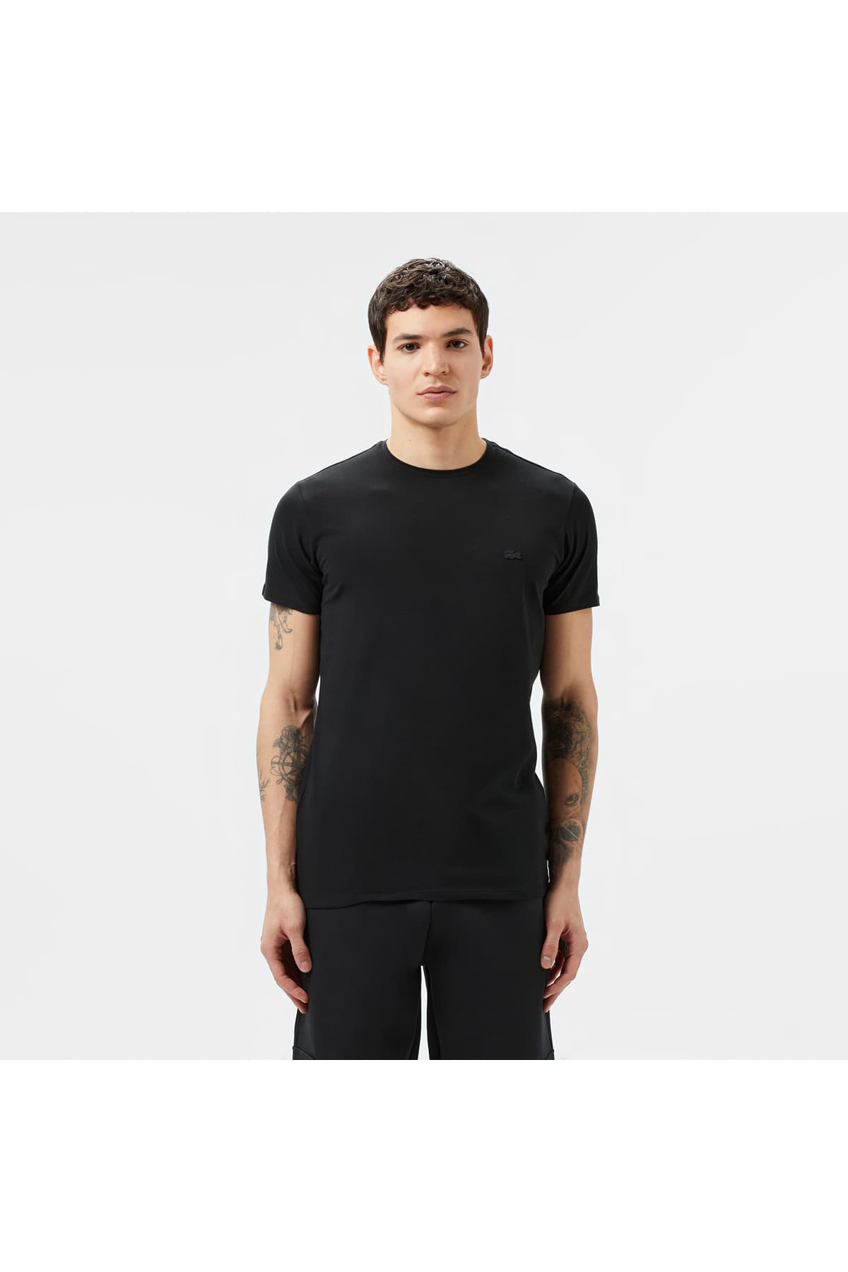 تیشرت مردانه Lacoste یقهگرد فیت اسلیم مشکی تیشرت مردانه Lacoste یقهگرد فیت اسلیم مشکی
