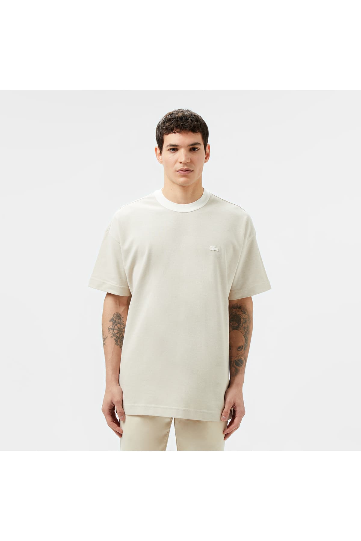 تیشرت مردانه Lacoste فیت اورسایز یقه گرد کرم تیشرت مردانه Lacoste فیت اورسایز یقه گرد کرم