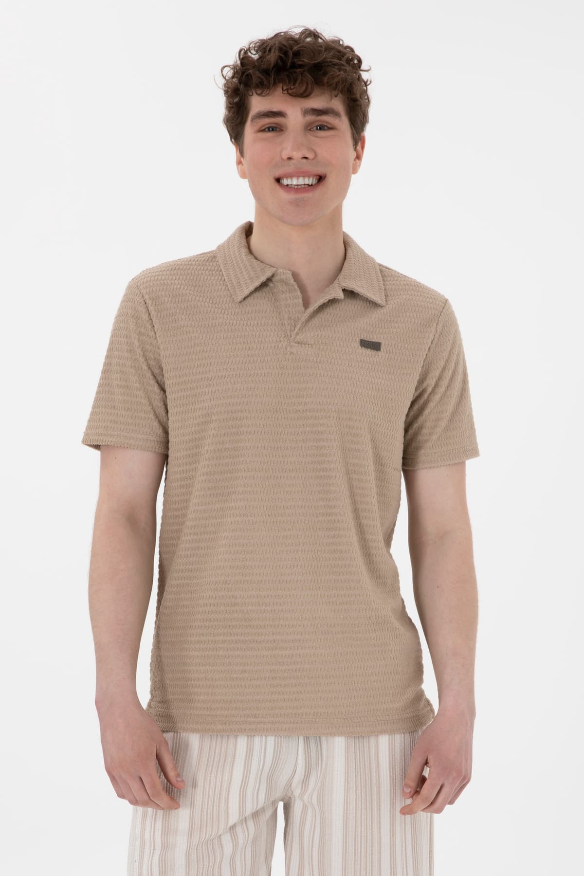 تیشرت مردانه U.S. Polo Assn. یقه پولو فیت معمولی بژ مدل 50299989-VR011 تیشرت مردانه U.S. Polo Assn. یقه پولو فیت معمولی بژ مدل 50299989-VR011