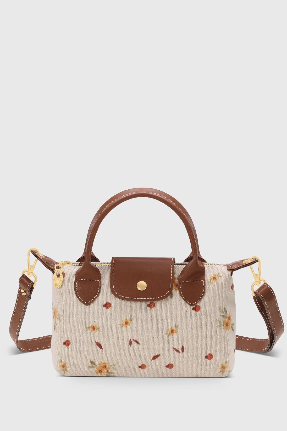 کیف دوشی زنانه Housebags چندمنظوره با طرح بابونه از جنس چرم PU مدل 280 کیف دوشی زنانه Housebags چندمنظوره با طرح بابونه از جنس چرم PU مدل 280