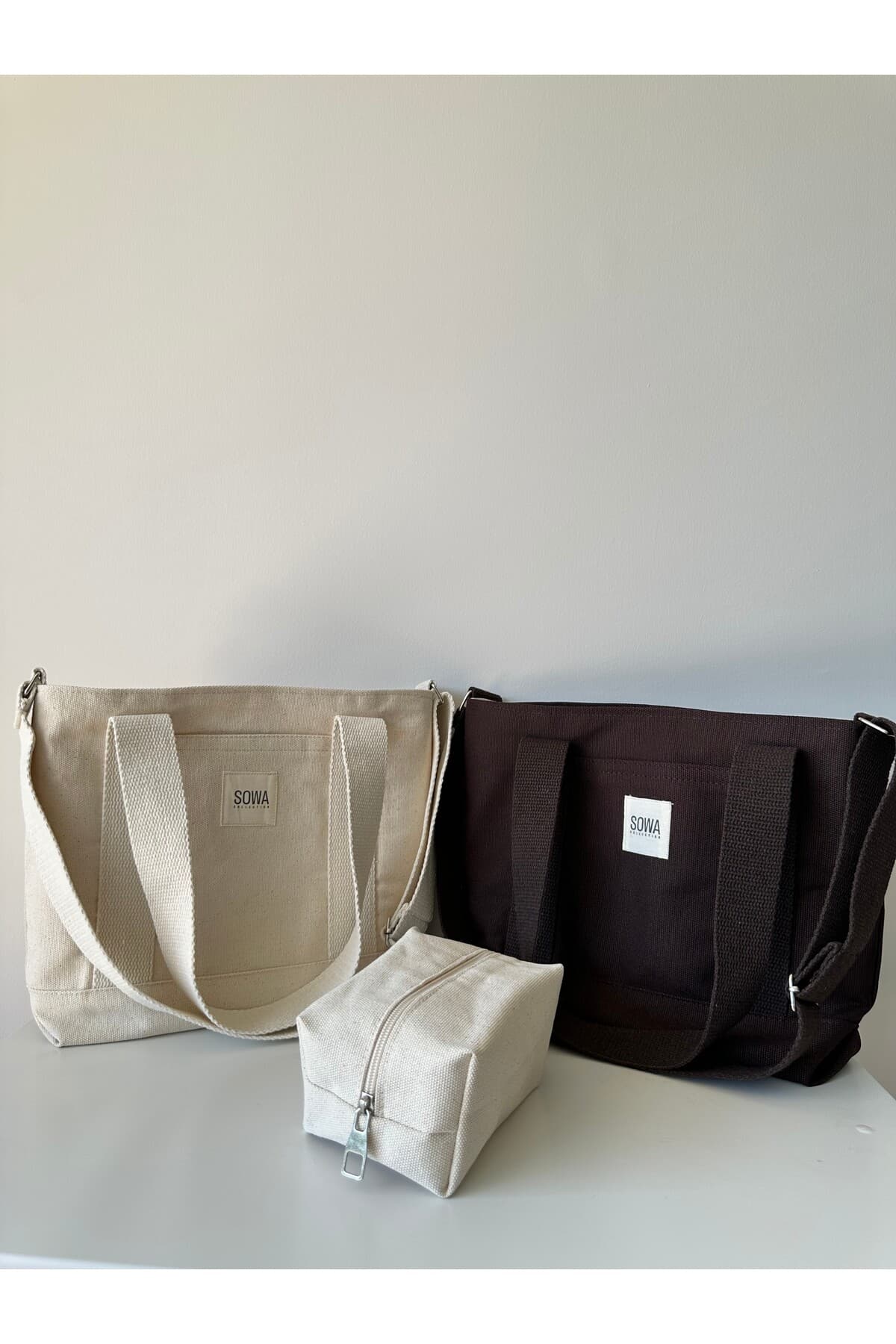 ست کیف دستی، دوشی و آرایش زنانه Sowa Collection کانواس آستردار با دکمه فشاری ست کیف دستی، دوشی و آرایش زنانه Sowa Collection کانواس آستردار با دکمه فشاری