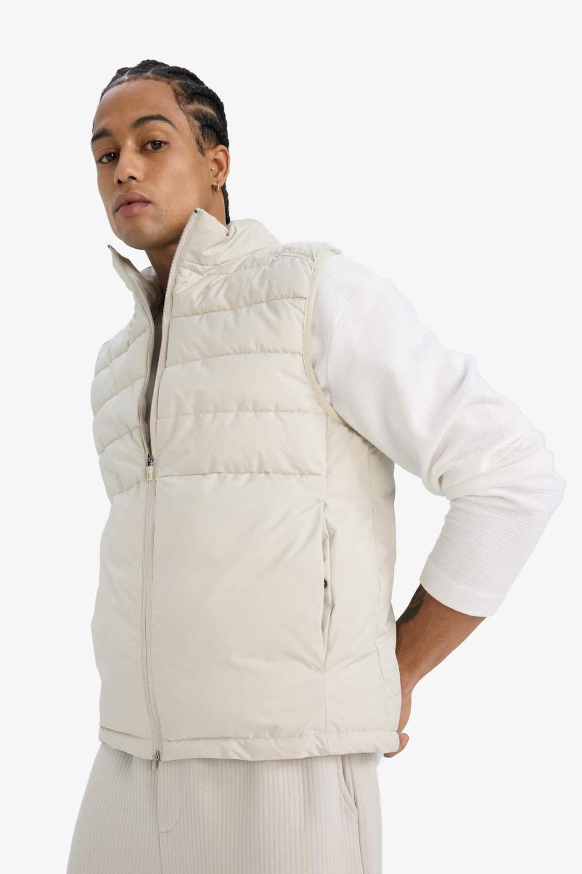 جلیقه بادی مردانه Defacto آبگریز ضدباد Slim Fit مدل E9215AX25AU جلیقه بادی مردانه Defacto آبگریز ضدباد Slim Fit مدل E9215AX25AU