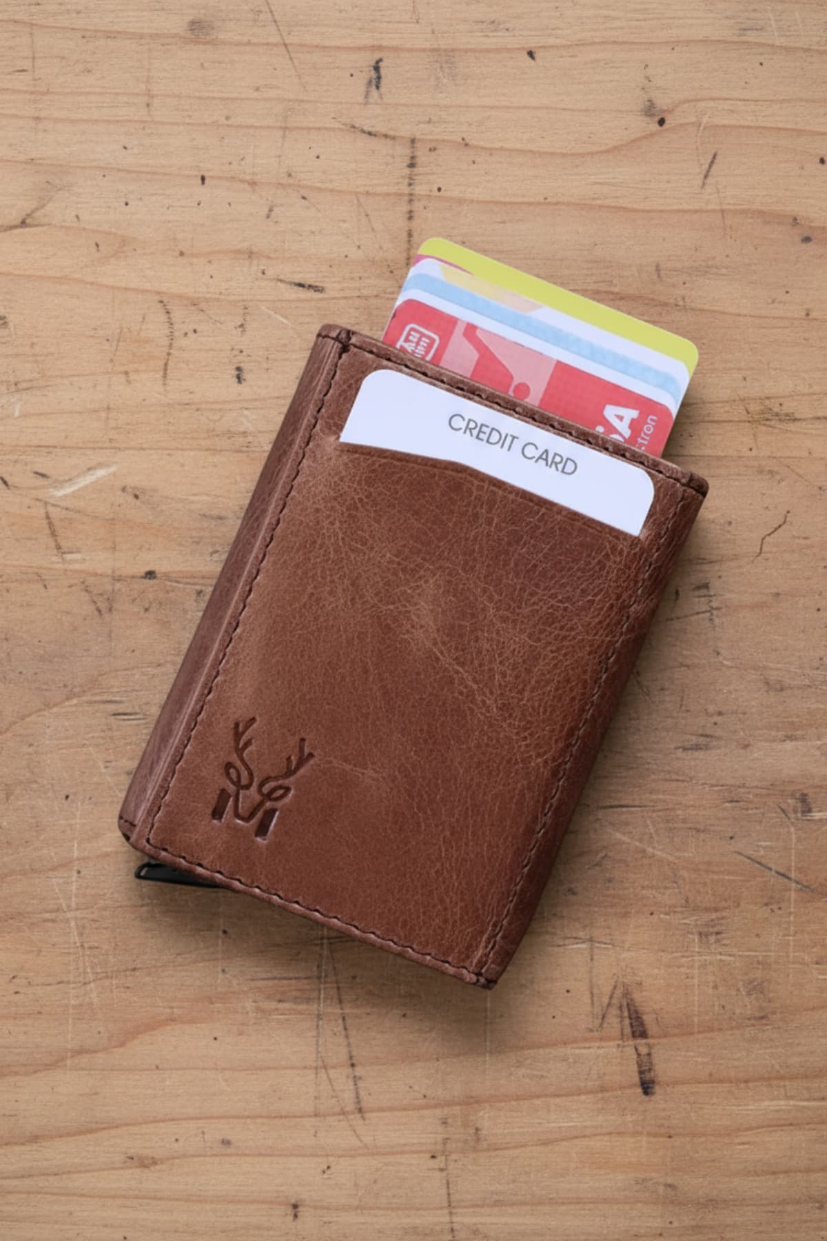 کیف پول کارتدار مردانه Modica چرم طبیعی قهوهای با مکانیزم اتوماتیک و محافظ RFID مدل Pescol کیف پول کارتدار مردانه Modica چرم طبیعی قهوهای با مکانیزم اتوماتیک و محافظ RFID مدل Pescol
