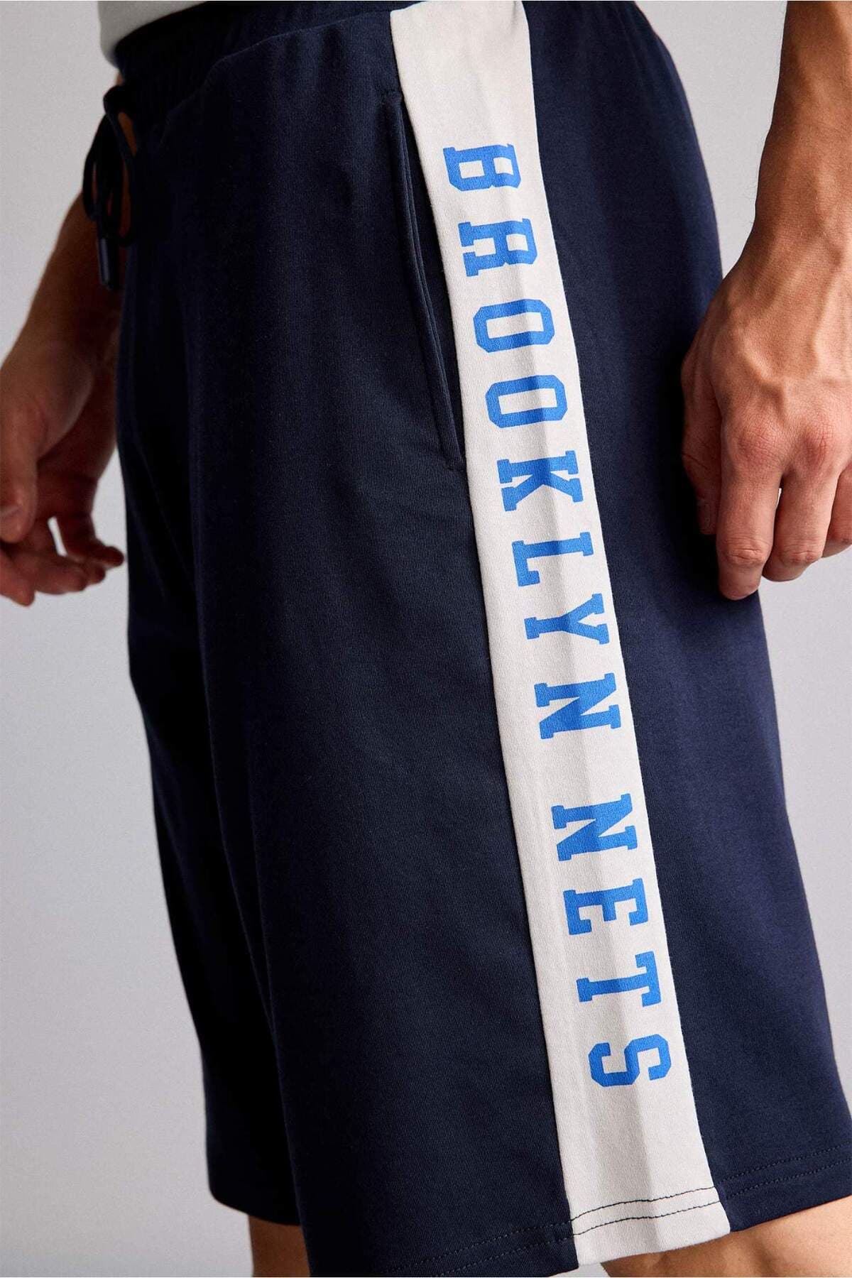 شورت مردانه Defacto %100 پنبه NBA Brooklyn Nets لایسنسدار بگی فیت سرمهای مدل H3850AX26SM شورت مردانه Defacto %100 پنبه NBA Brooklyn Nets لایسنسدار بگی فیت سرمهای مدل H3850AX26SM