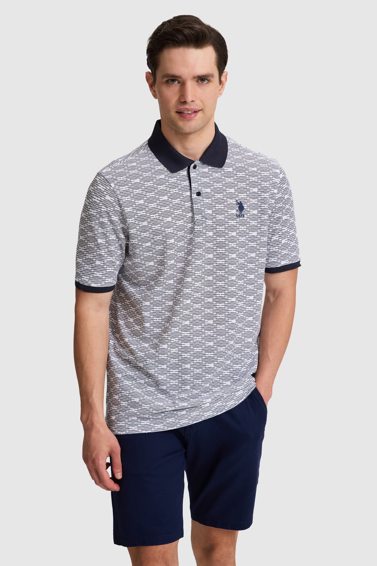 تیشرت یقه پولو مردانه U.S. Polo Assn. فیت معمولی سرمهای مدل 50326959-VR033 تیشرت یقه پولو مردانه U.S. Polo Assn. فیت معمولی سرمهای مدل 50326959-VR033