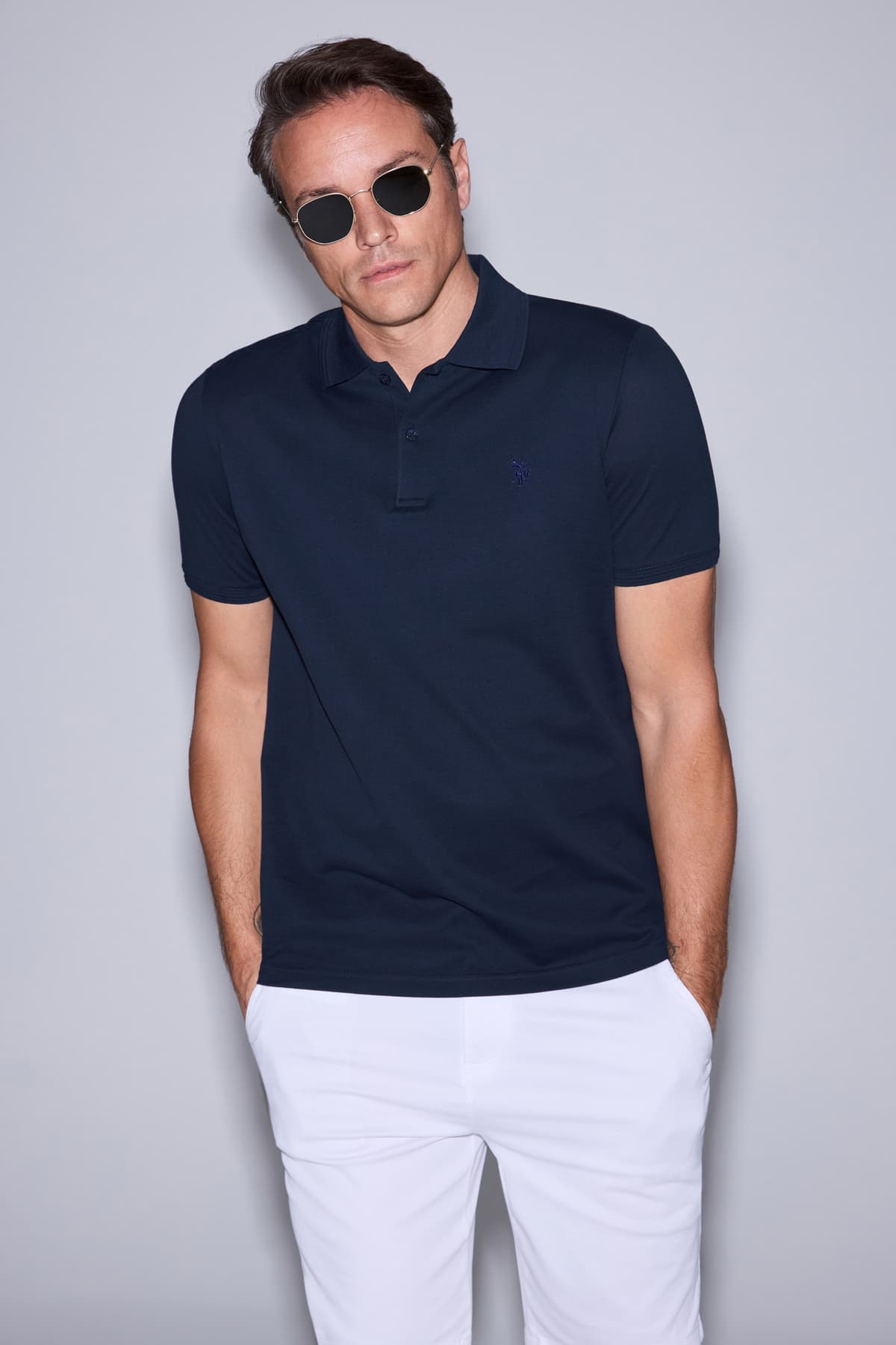 تیشرت مردانه U.S. Polo Assn. سرمهای تیره فیت معمولی یقه پولو مدل 50324938-VR100 تیشرت مردانه U.S. Polo Assn. سرمهای تیره فیت معمولی یقه پولو مدل 50324938-VR100