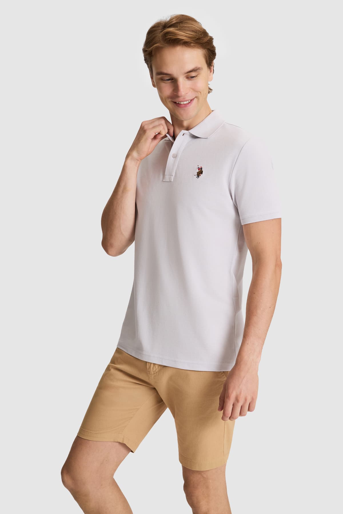تیشرت مردانه یقه پولو U.S. Polo Assn. کرم ساده با فیت معمولی مدل 50326972-VR071 تیشرت مردانه یقه پولو U.S. Polo Assn. کرم ساده با فیت معمولی مدل 50326972-VR071
