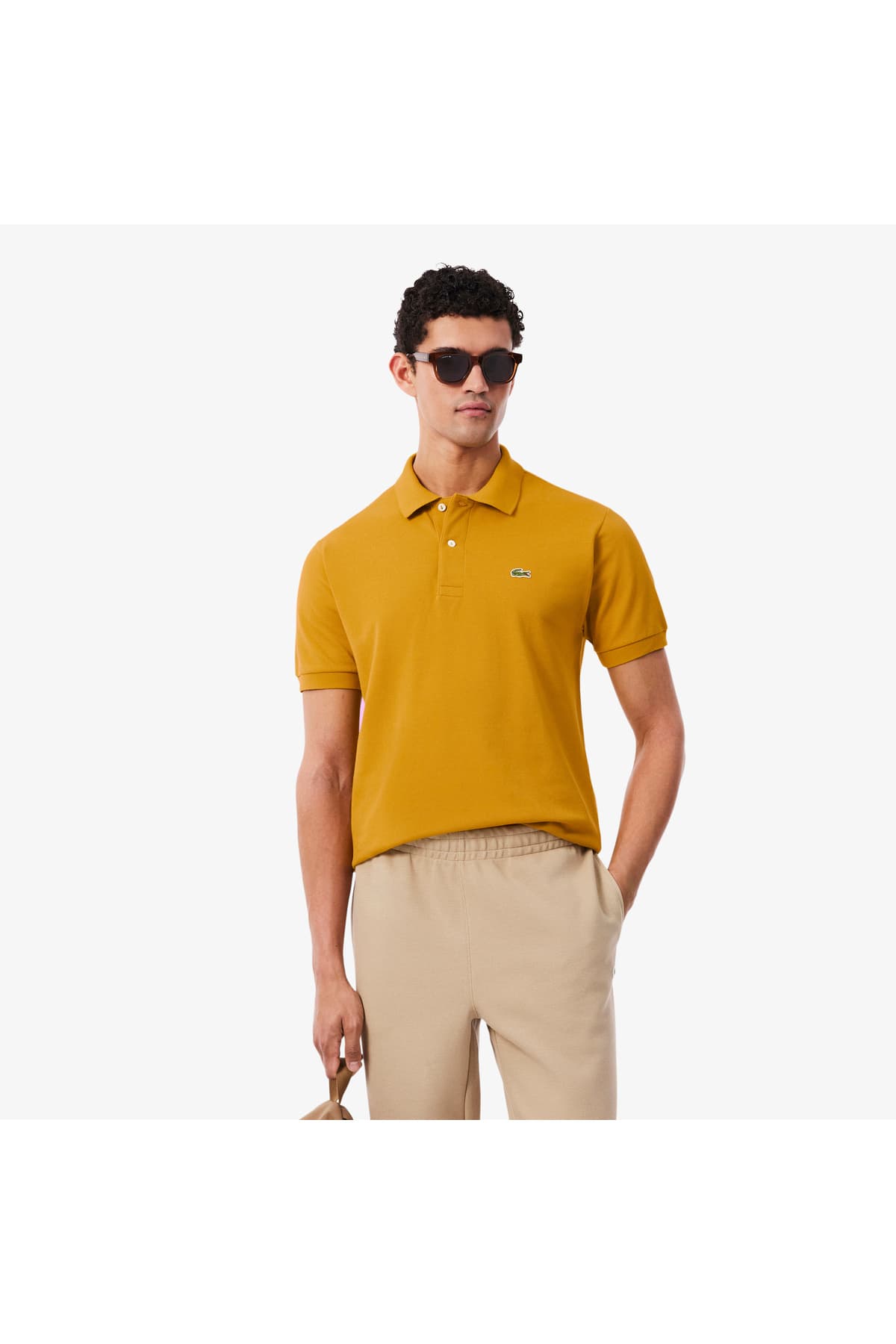پولوشرت مردانه Lacoste فیت کلاسیک نارنجی مدل L.12.12 پولوشرت مردانه Lacoste فیت کلاسیک نارنجی مدل L.12.12