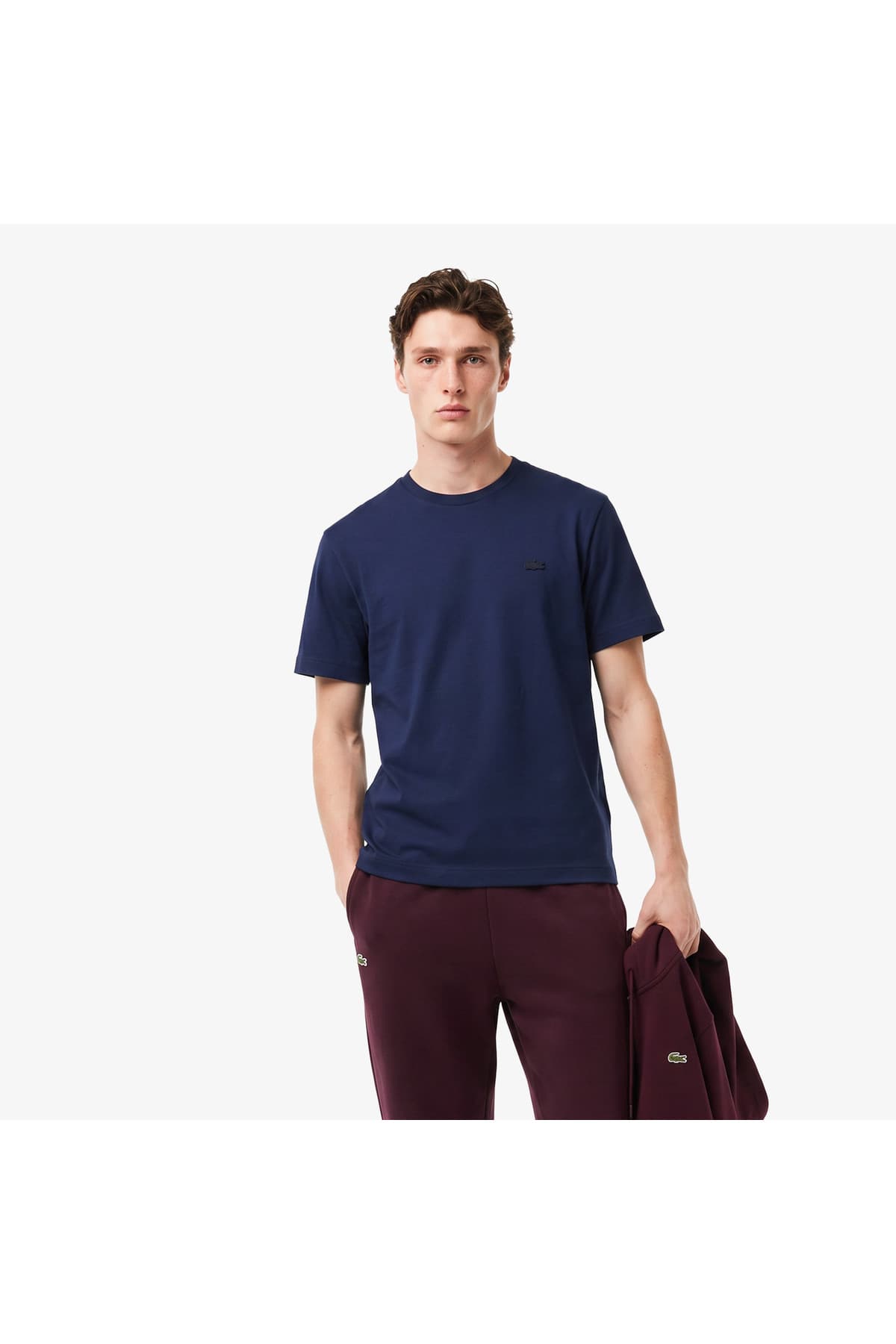 تیشرت مردانه Lacoste فیت اورسایز یقه گرد سرمهای تیشرت مردانه Lacoste فیت اورسایز یقه گرد سرمهای