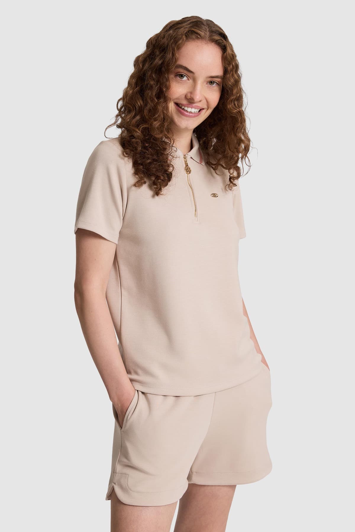 تیشرت زنانه یقه پولو U.S. Polo Assn. نیمزیپ رنگ سنگی مدل 50323481-VR049 تیشرت زنانه یقه پولو U.S. Polo Assn. نیمزیپ رنگ سنگی مدل 50323481-VR049