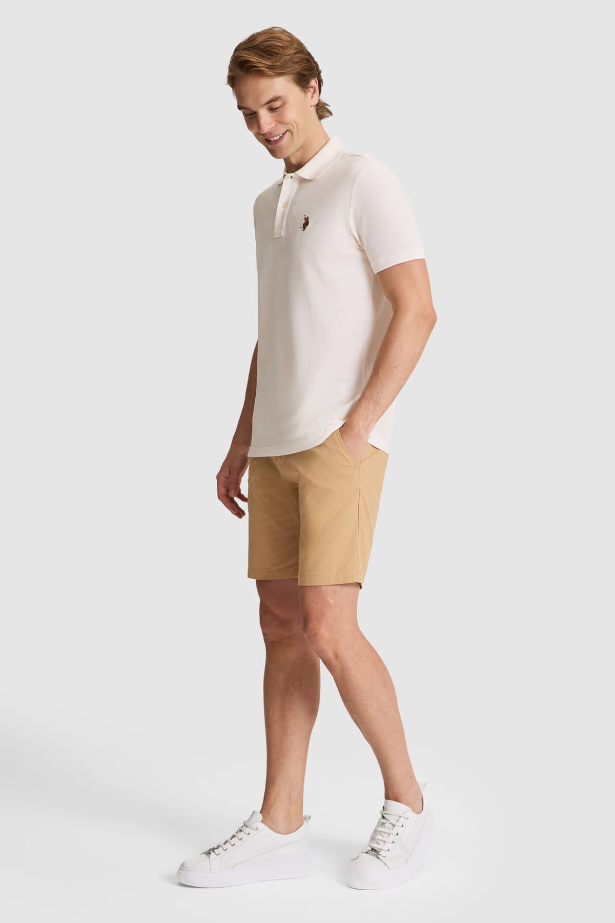 تیشرت مردانه یقه پولو U.S. Polo Assn. کرم ساده با فیت معمولی مدل 50326972-VR071 تیشرت مردانه یقه پولو U.S. Polo Assn. کرم ساده با فیت معمولی مدل 50326972-VR071