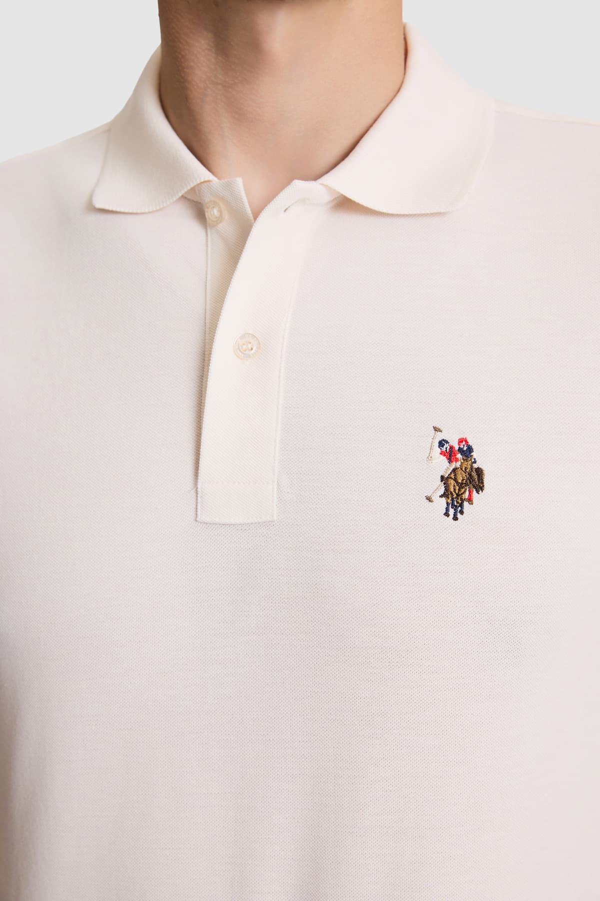 تیشرت مردانه یقه پولو U.S. Polo Assn. کرم ساده با فیت معمولی مدل 50326972-VR071 تیشرت مردانه یقه پولو U.S. Polo Assn. کرم ساده با فیت معمولی مدل 50326972-VR071