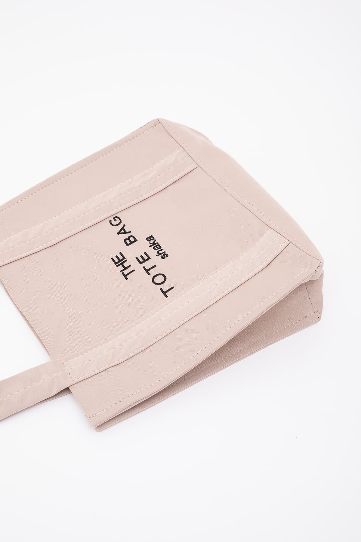 کیف دستی و دوشی زنانه Shaka The Tote Bag کانواس کرم گلدوزیشده با دکمه فشاری مدل U45 25x30 کیف دستی و دوشی زنانه Shaka The Tote Bag کانواس کرم گلدوزیشده با دکمه فشاری مدل U45 25x30