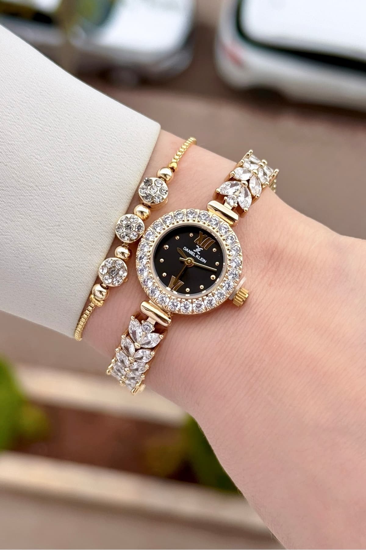 ساعت مچی زنانه Daniel Klein صفحه مشکی بند مشکی طلایی 22,5 mm مدل عروس ساعت مچی زنانه Daniel Klein صفحه مشکی بند مشکی طلایی 22,5 mm مدل عروس