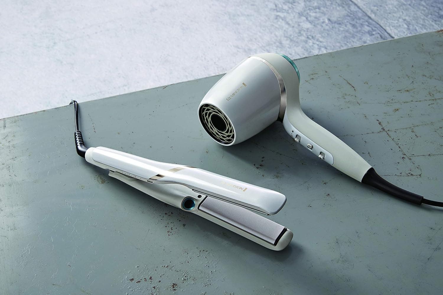 اتو مو Remington Hydraluxe Pro با فناوری مه Hydracare و روکش سرامیکی مدل S9001 اتو مو Remington Hydraluxe Pro با فناوری مه Hydracare و روکش سرامیکی مدل S9001
