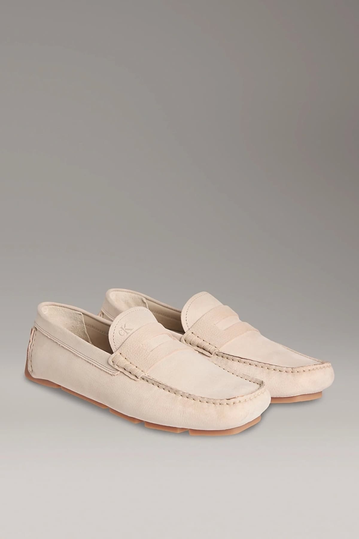 کفش لوفر مردانه Calvin Klein نابوک بژ Penny Driver مدل HM0HM01866-ACE کفش لوفر مردانه Calvin Klein نابوک بژ Penny Driver مدل HM0HM01866-ACE