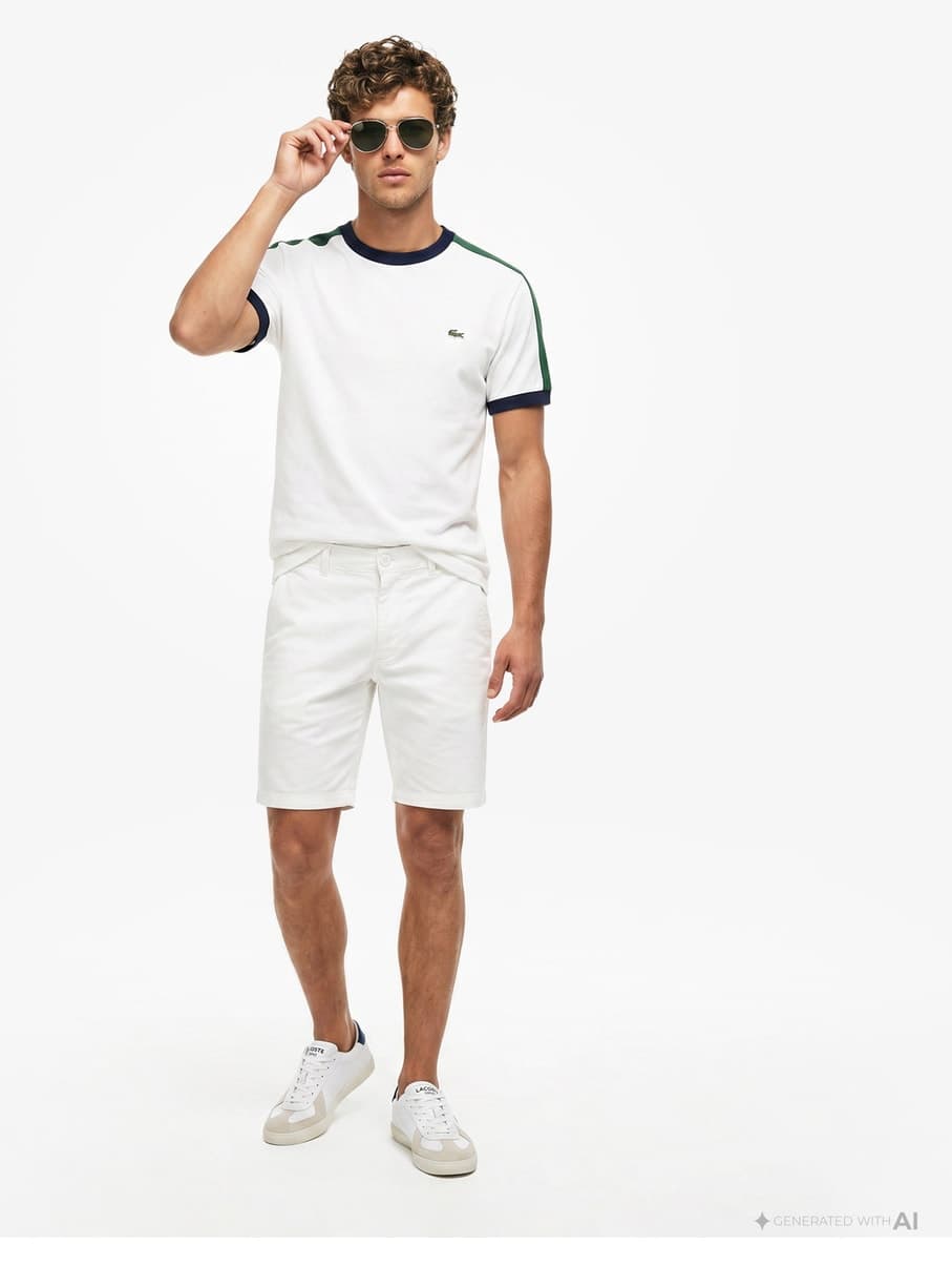 تیشرت مردانه Lacoste یقه گرد فیت معمولی سفید با طراحی رنگبندی مدل بلوکی تیشرت مردانه Lacoste یقه گرد فیت معمولی سفید با طراحی رنگبندی مدل بلوکی