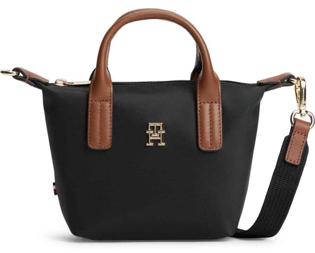 کیف زنانه Tommy Hilfiger مشکی با لوگوی فلزی TH و بند بلند جداشونده کیف زنانه Tommy Hilfiger مشکی با لوگوی فلزی TH و بند بلند جداشونده