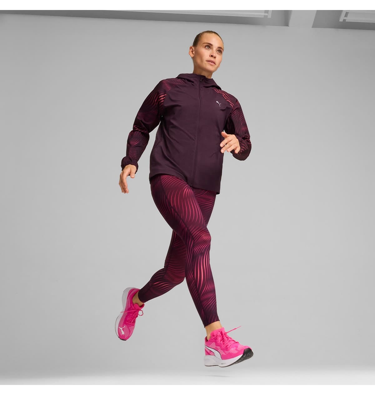 ژاکت دویدن زنانه Puma بنفش چاپ AOP Run Favorite مدل 52403544 ژاکت دویدن زنانه Puma بنفش چاپ AOP Run Favorite مدل 52403544
