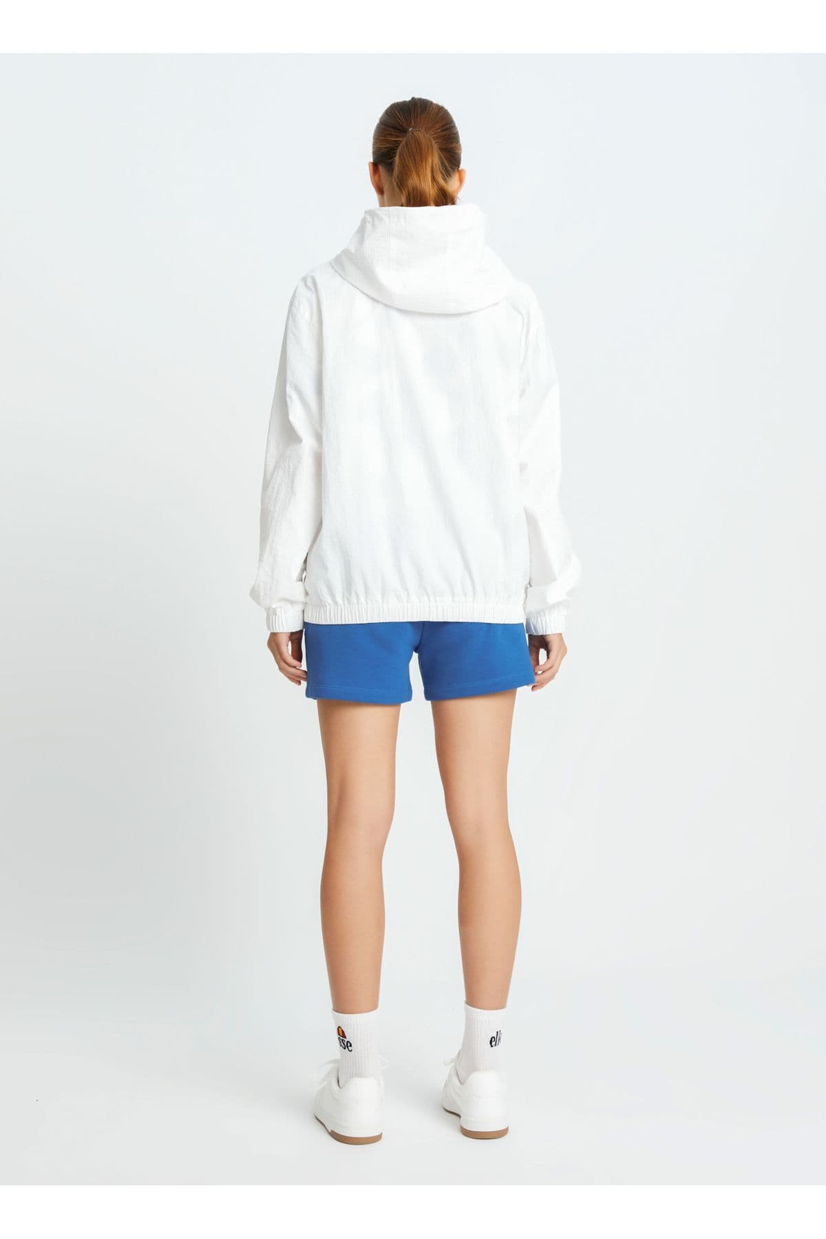 بادگیر زنانه Ellesse سفید شکسته مدل EF100-OF بادگیر زنانه Ellesse سفید شکسته مدل EF100-OF