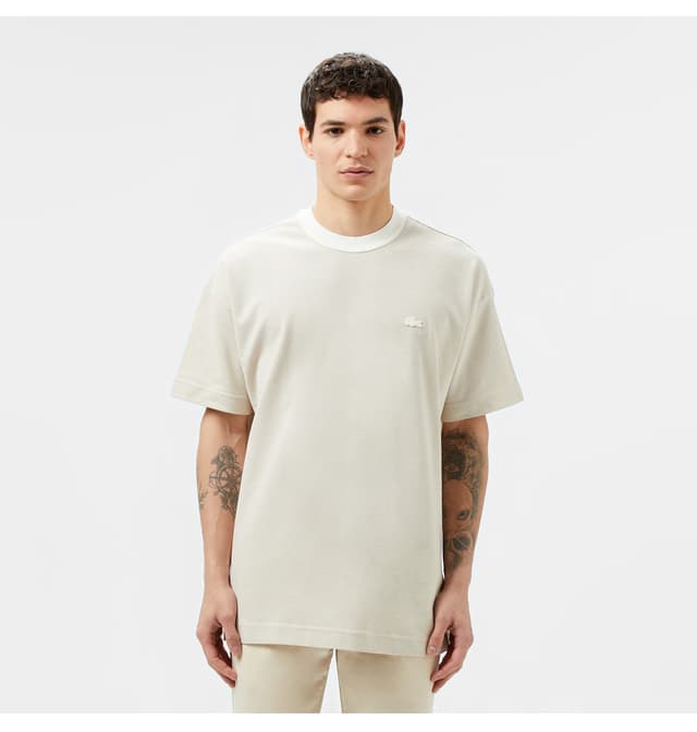 تیشرت مردانه Lacoste فیت اورسایز یقه گرد کرم تیشرت مردانه Lacoste فیت اورسایز یقه گرد کرم