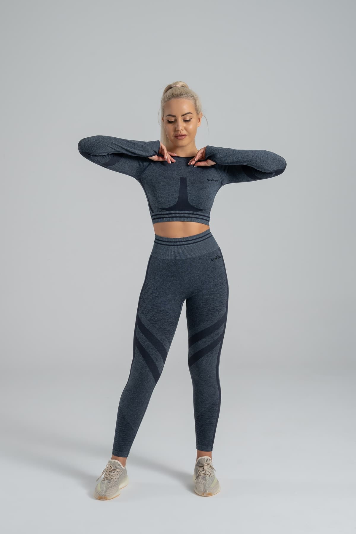 لگینگ فرمدهنده GYMXPRO با جزئیات پوشآپ و حلقهدار لگینگ فرمدهنده GYMXPRO با جزئیات پوشآپ و حلقهدار