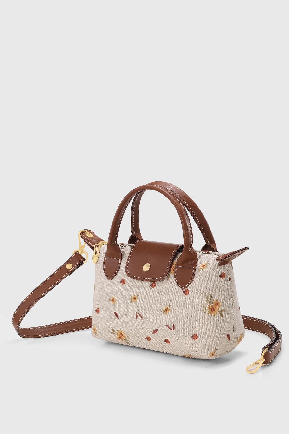 کیف دوشی زنانه Housebags چندمنظوره با طرح بابونه از جنس چرم PU مدل 280 کیف دوشی زنانه Housebags چندمنظوره با طرح بابونه از جنس چرم PU مدل 280