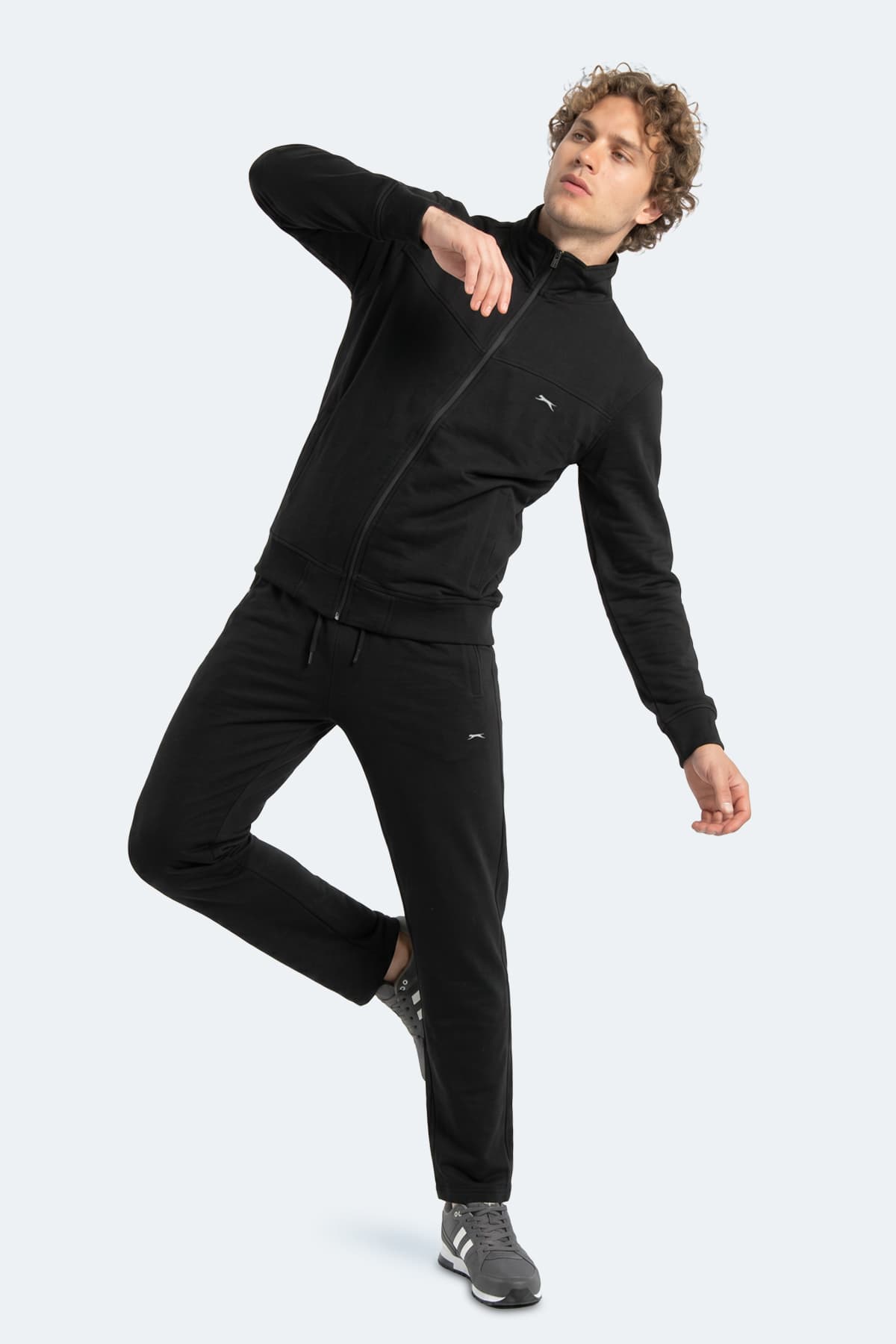 ست گرمکن مردانه Slazenger زیپ دار یقه ایستاده جیب دار مشکی مدل BOOST GEAR ست گرمکن مردانه Slazenger زیپ دار یقه ایستاده جیب دار مشکی مدل BOOST GEAR