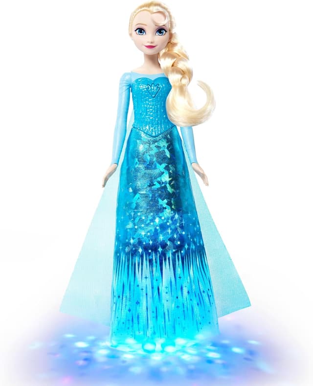 عروسک آوازخوان Elsa Mattel Disney Frozen چهارزبانه با افکت نوری و لباس درخشان مدل JNB95 عروسک آوازخوان Elsa Mattel Disney Frozen چهارزبانه با افکت نوری و لباس درخشان مدل JNB95