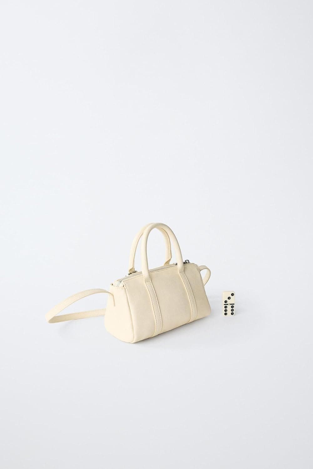 کیف دخترانه Zara با آویز تزئینی و بند ضربدری کیف دخترانه Zara با آویز تزئینی و بند ضربدری