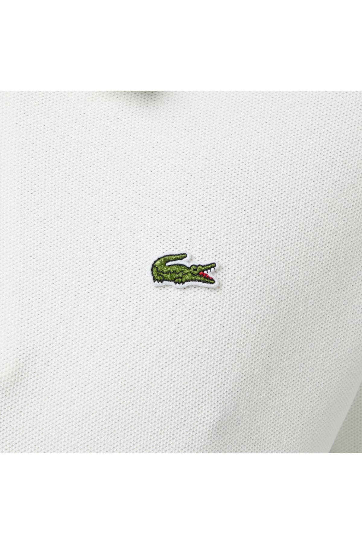 بافت مردانه Lacoste فیت کلاسیک آستین کوتاه یقه نیمزیپ سفید بافت مردانه Lacoste فیت کلاسیک آستین کوتاه یقه نیمزیپ سفید
