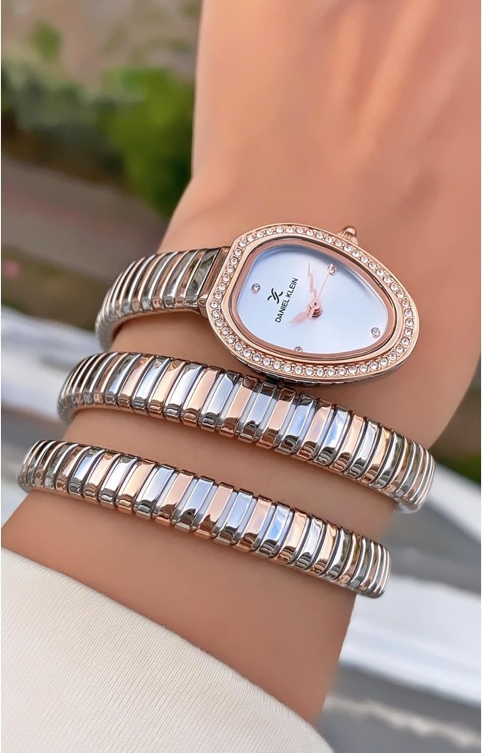 ساعت مچی زنانه Daniel Klein رنگ نقرهای رز بند طرح مار گارانتی 2 ساله ساعت مچی زنانه Daniel Klein رنگ نقرهای رز بند طرح مار گارانتی 2 ساله