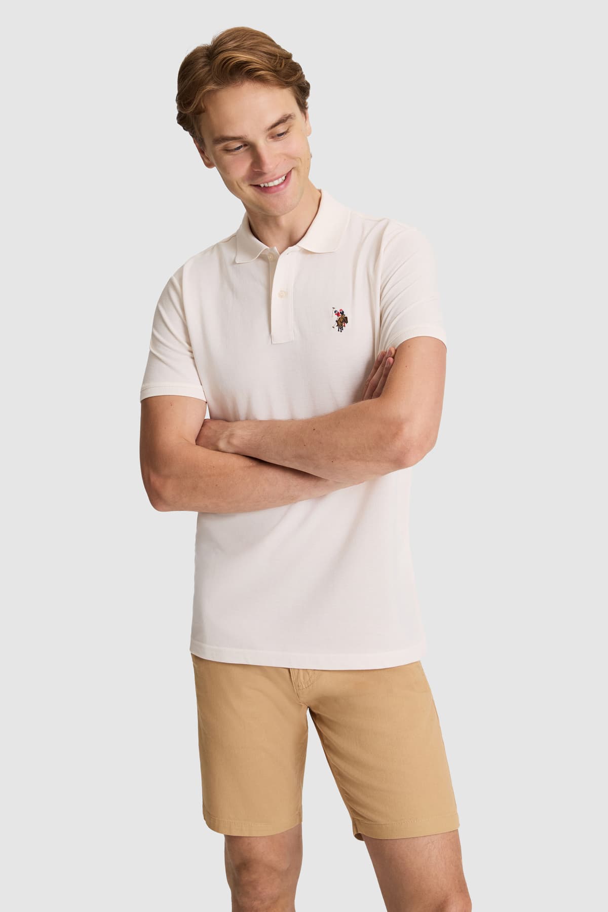 تیشرت مردانه یقه پولو U.S. Polo Assn. کرم ساده با فیت معمولی مدل 50326972-VR071 تیشرت مردانه یقه پولو U.S. Polo Assn. کرم ساده با فیت معمولی مدل 50326972-VR071