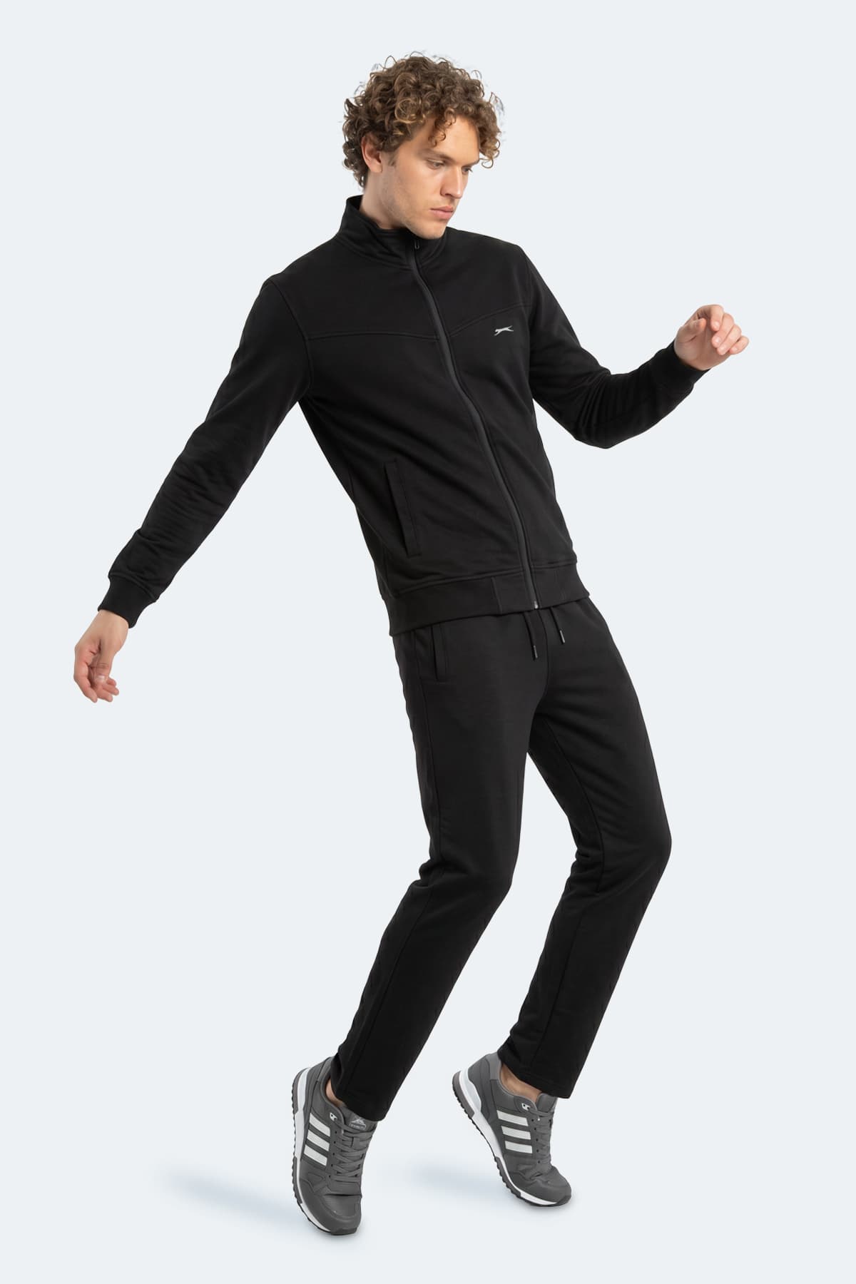 ست گرمکن مردانه Slazenger زیپ دار یقه ایستاده جیب دار مشکی مدل BOOST GEAR ست گرمکن مردانه Slazenger زیپ دار یقه ایستاده جیب دار مشکی مدل BOOST GEAR