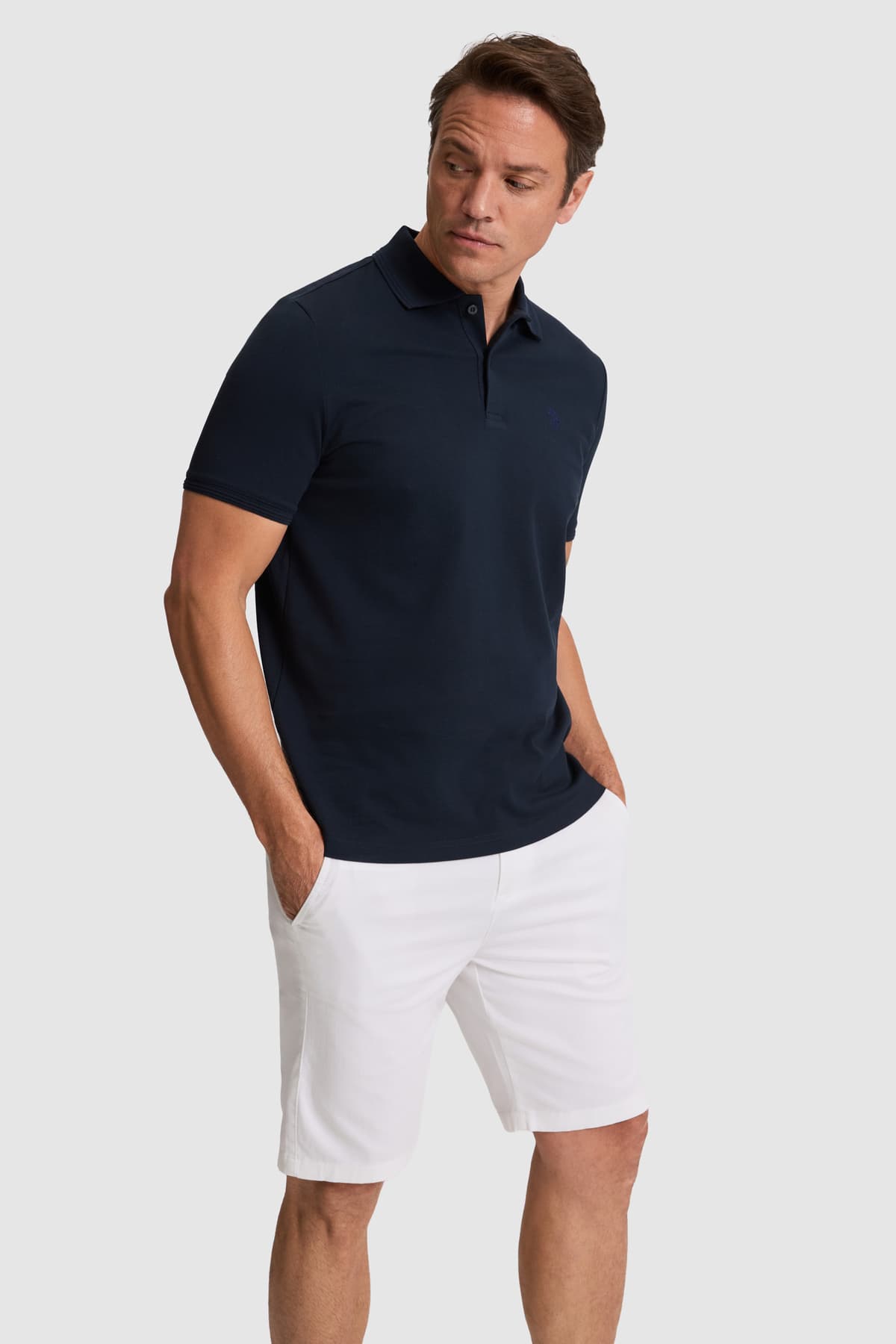 تیشرت مردانه U.S. Polo Assn. سرمهای تیره فیت معمولی یقه پولو مدل 50324938-VR100 تیشرت مردانه U.S. Polo Assn. سرمهای تیره فیت معمولی یقه پولو مدل 50324938-VR100