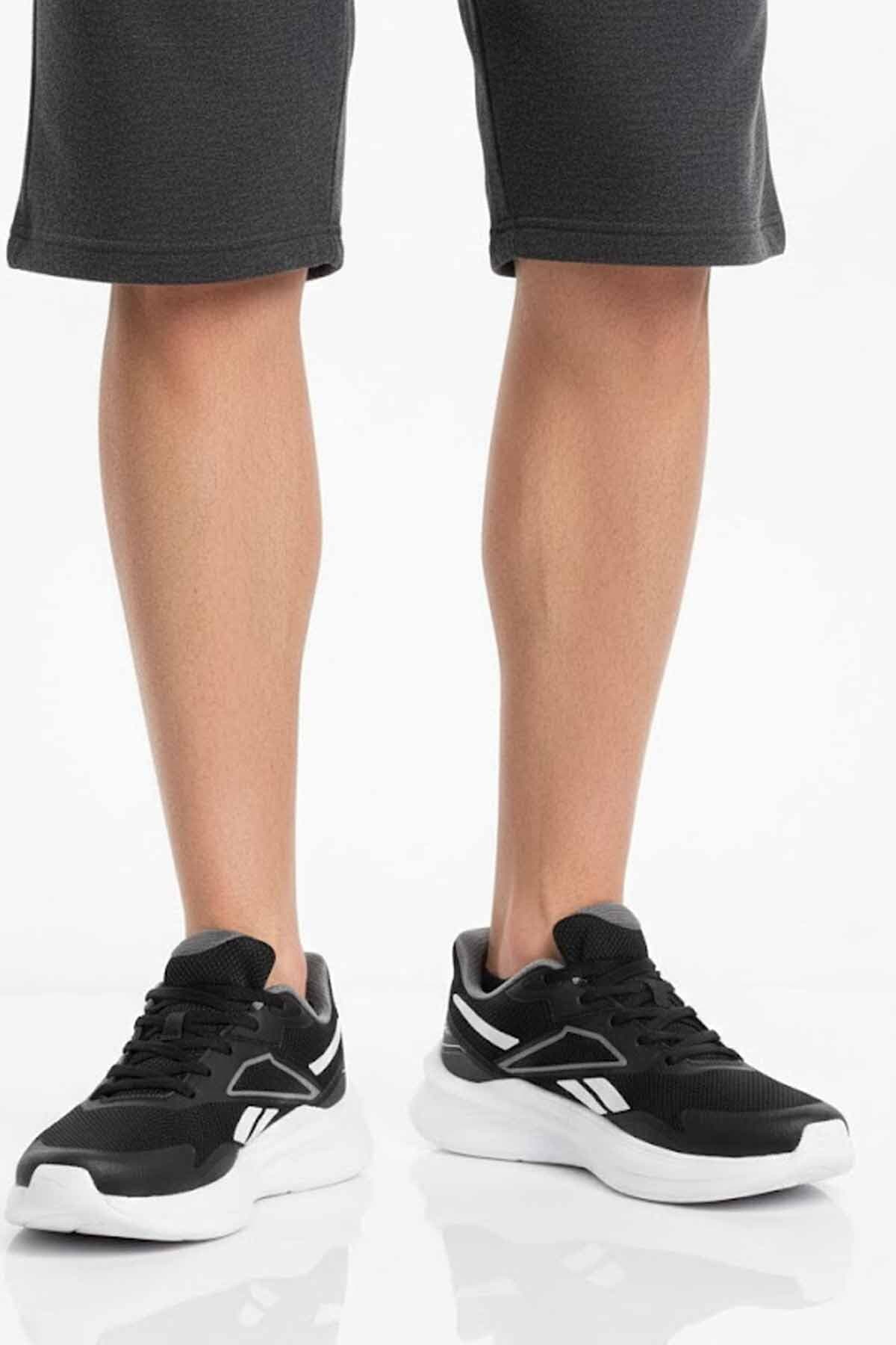 کفش ورزشی مردانه Reebok مشکیوسفید با زیره سبک و قالب راحت مدل C1 کفش ورزشی مردانه Reebok مشکیوسفید با زیره سبک و قالب راحت مدل C1