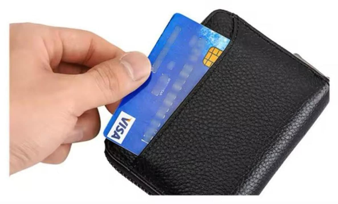 کیف پول و کارتخور مردانه SEPTWOLVES چرم طبیعی با زیپ فلزی مشکی کیف پول و کارتخور مردانه SEPTWOLVES چرم طبیعی با زیپ فلزی مشکی