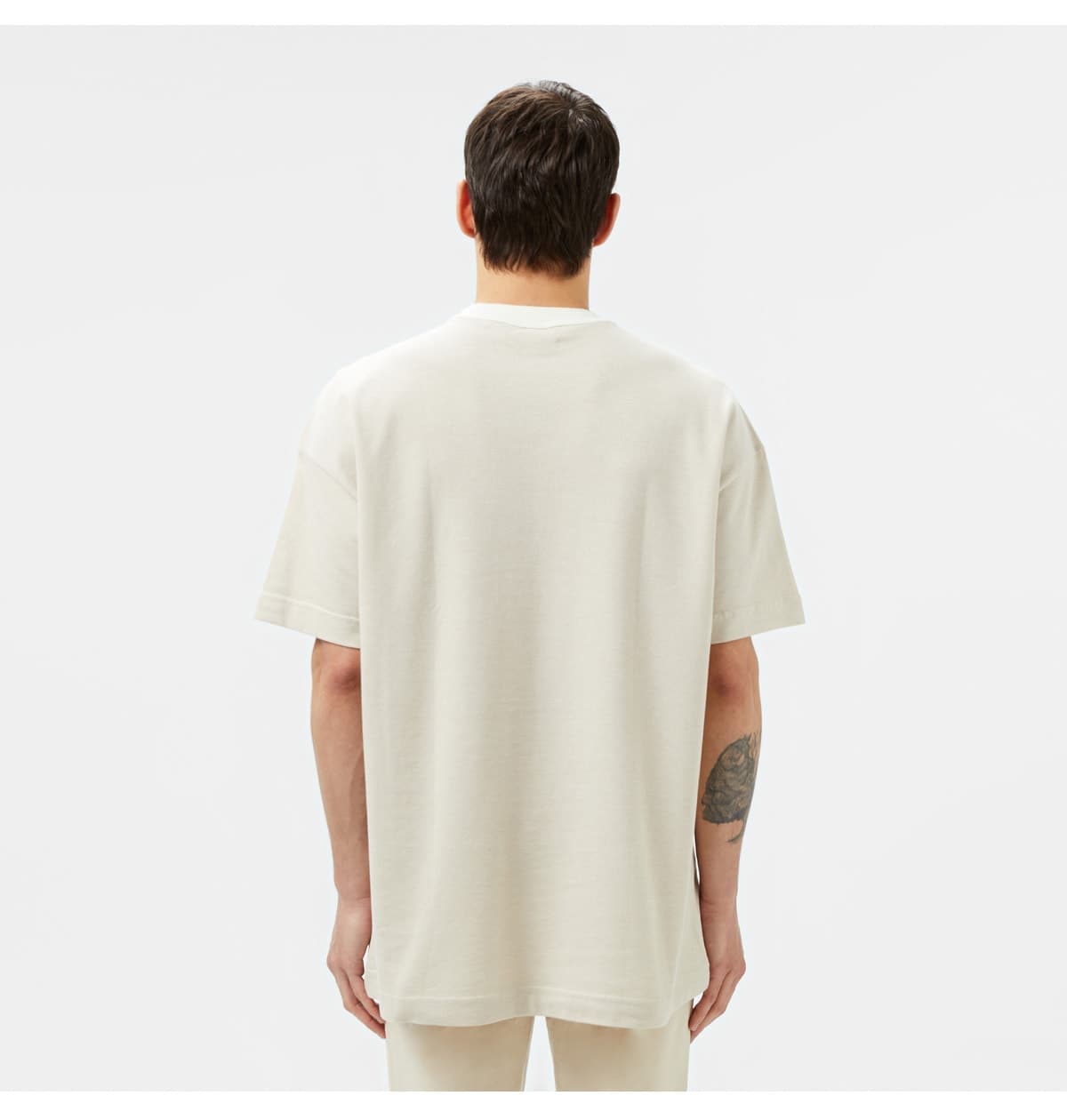 تیشرت مردانه Lacoste فیت اورسایز یقه گرد کرم تیشرت مردانه Lacoste فیت اورسایز یقه گرد کرم