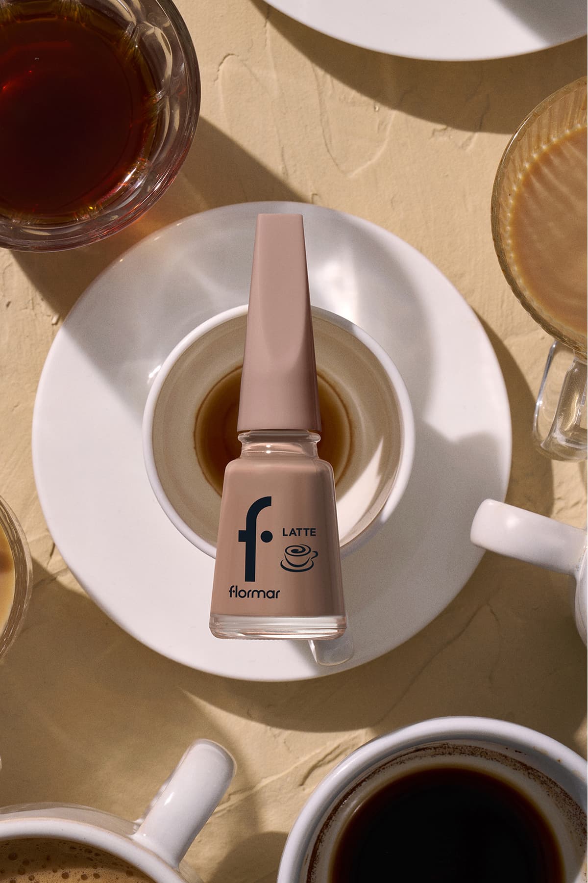 لاک ناخن Flormar Latte قهوهای با رنگدانه بالا و پایان براق لاک ناخن Flormar Latte قهوهای با رنگدانه بالا و پایان براق