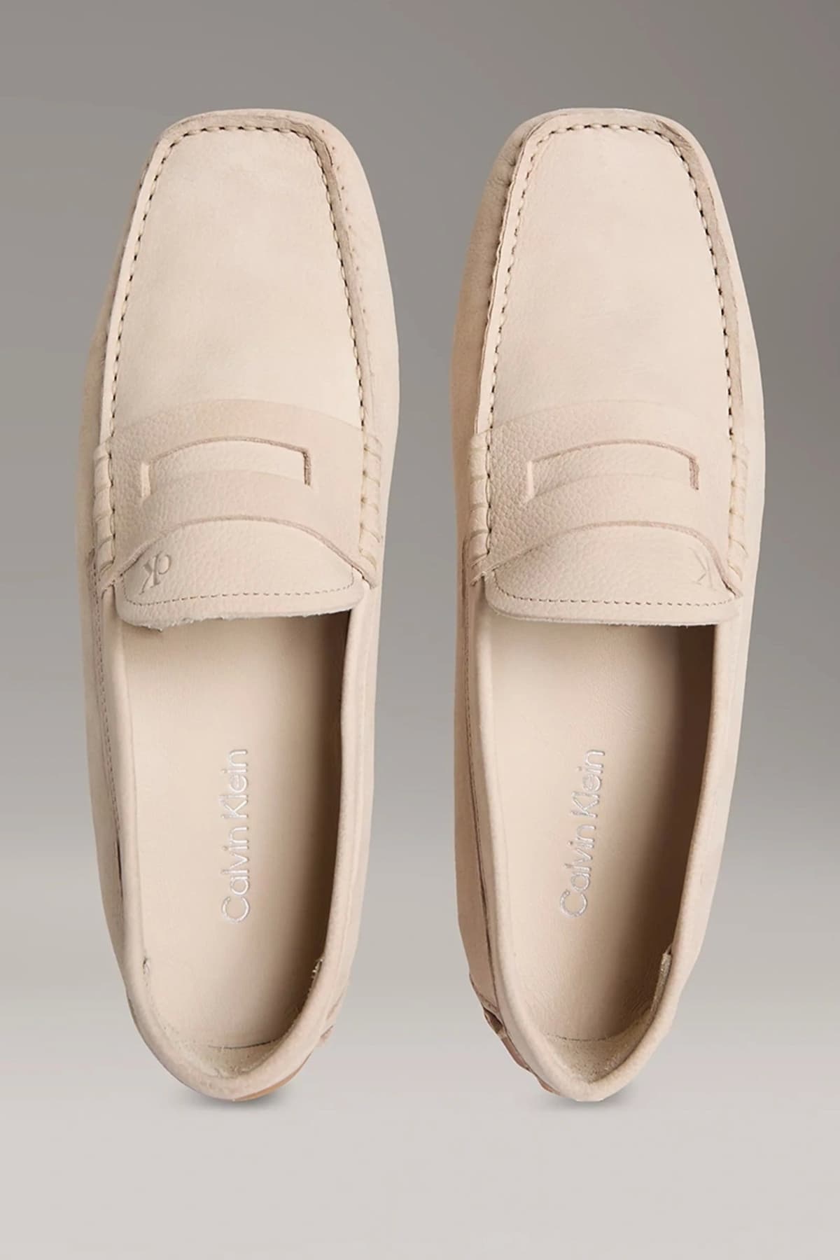 کفش لوفر مردانه Calvin Klein نابوک بژ Penny Driver مدل HM0HM01866-ACE کفش لوفر مردانه Calvin Klein نابوک بژ Penny Driver مدل HM0HM01866-ACE