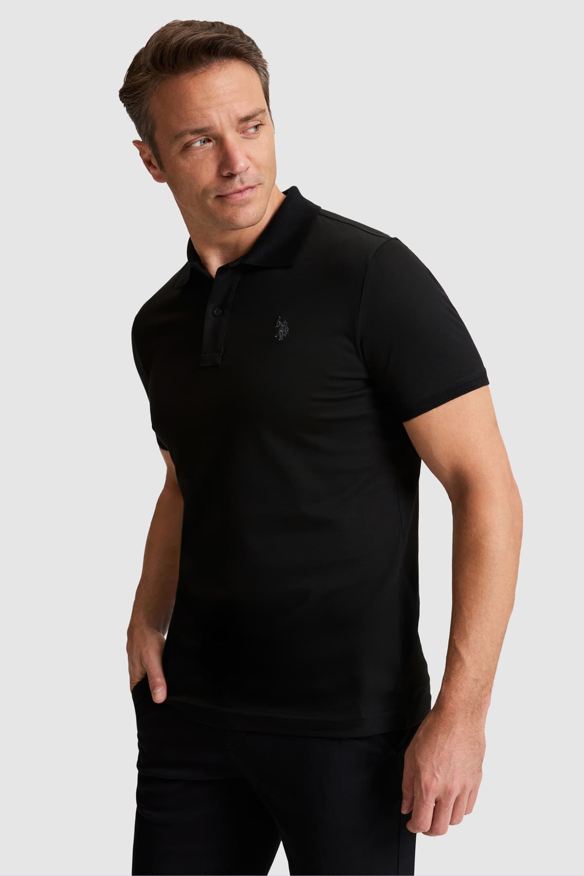 تیشرت مردانه U.S. Polo Assn. ساده مشکی فیت معمولی یقه پولو مدل 50322297-VR046 تیشرت مردانه U.S. Polo Assn. ساده مشکی فیت معمولی یقه پولو مدل 50322297-VR046