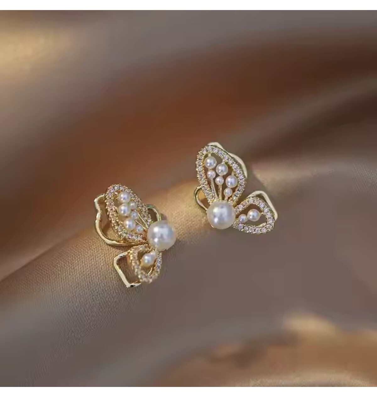 گوشواره زنانه HOBİSY GIFT SHOP طرح پروانه مرواریدی ضد حساسیت روکش طلا گوشواره زنانه HOBİSY GIFT SHOP طرح پروانه مرواریدی ضد حساسیت روکش طلا