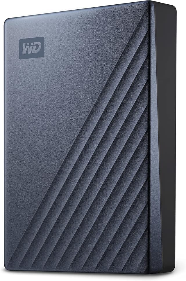 هارد دیسک اکسترنال قابل حمل Western Digital My Passport Ultra آبی 5TB سازگار با USB-C و USB 3.1 مدل BFTM0050BBL-WESN هارد دیسک اکسترنال قابل حمل Western Digital My Passport Ultra آبی 5TB سازگار با USB-C و USB 3.1 مدل BFTM0050BBL-WESN