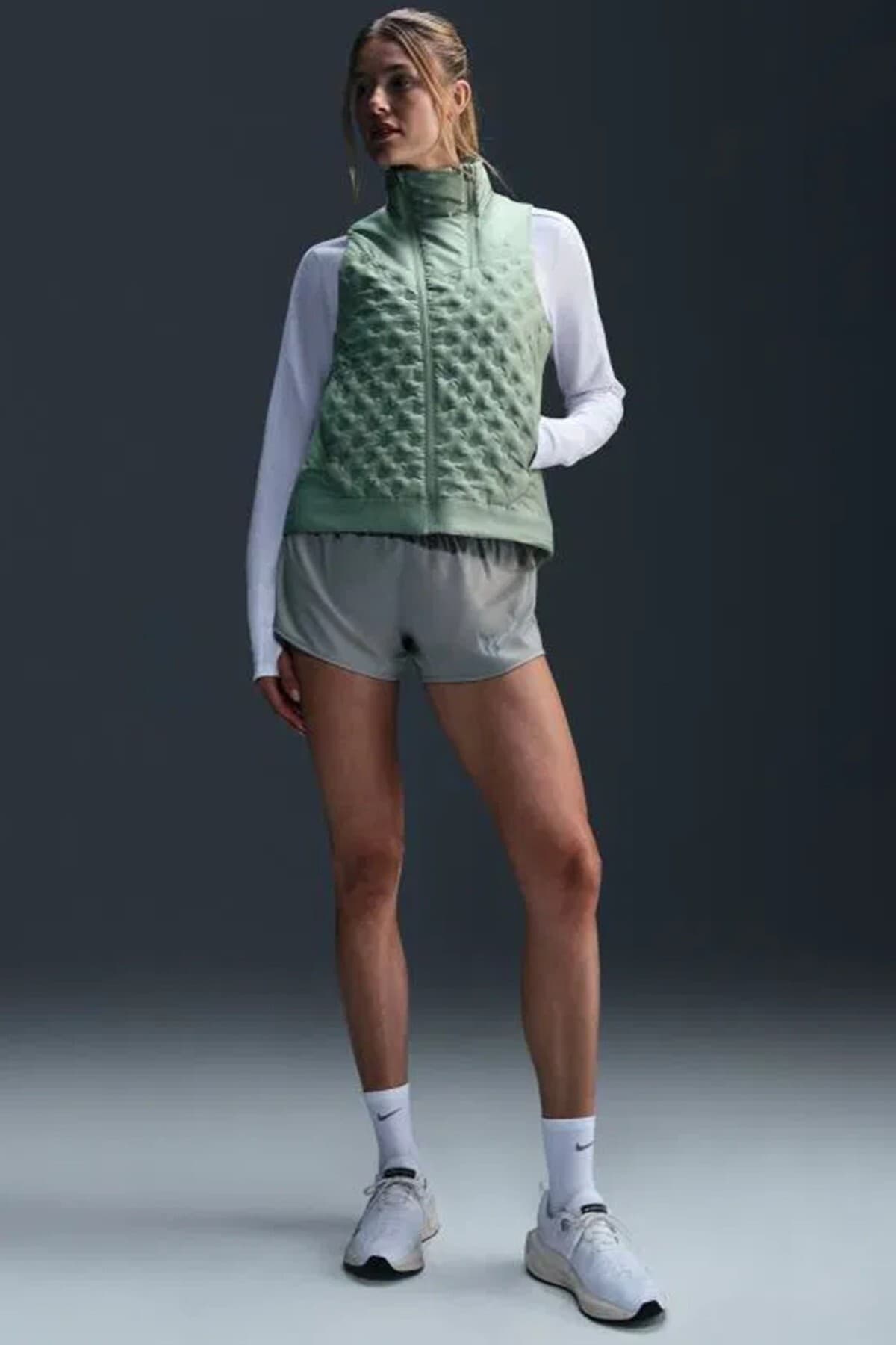 جلیقه زنانه Nike Therma Fit دویدن با پرکننده مصنوعی ترمال و بازتابنده جلیقه زنانه Nike Therma Fit دویدن با پرکننده مصنوعی ترمال و بازتابنده