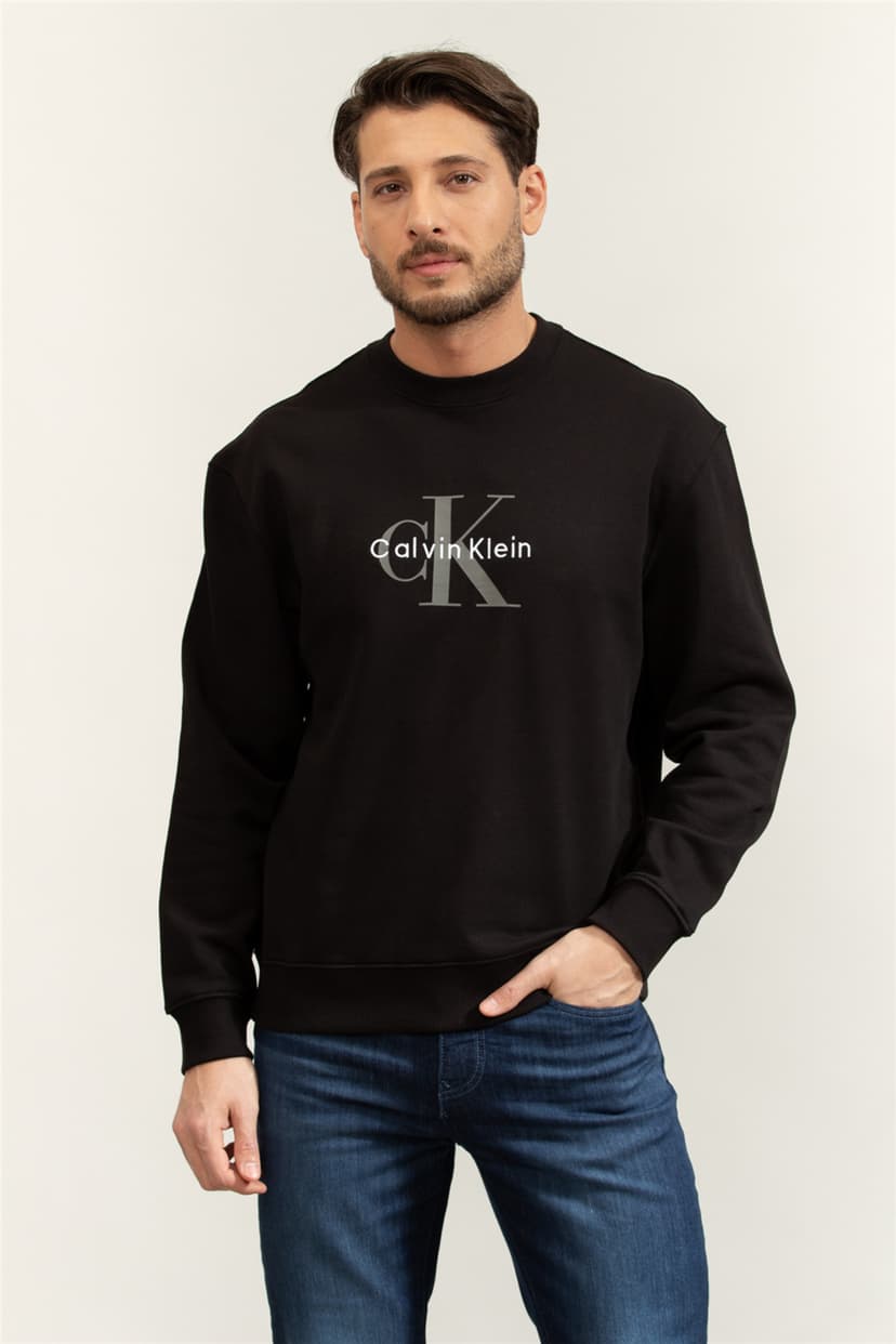 سوئیشرت مردانه Calvin Klein نخی ۱۰۰٪ یقهگرد آستینبلند مشکی لوگودار CK سوئیشرت مردانه Calvin Klein نخی ۱۰۰٪ یقهگرد آستینبلند مشکی لوگودار CK