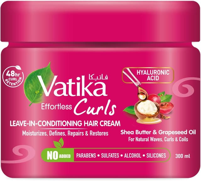 کرم نرمکننده بدون آبکشی موهای فر Vatika حاوی کره شی، روغن هسته انگور و اسید هیالورونیک 300ml کرم نرمکننده بدون آبکشی موهای فر Vatika حاوی کره شی، روغن هسته انگور و اسید هیالورونیک 300ml