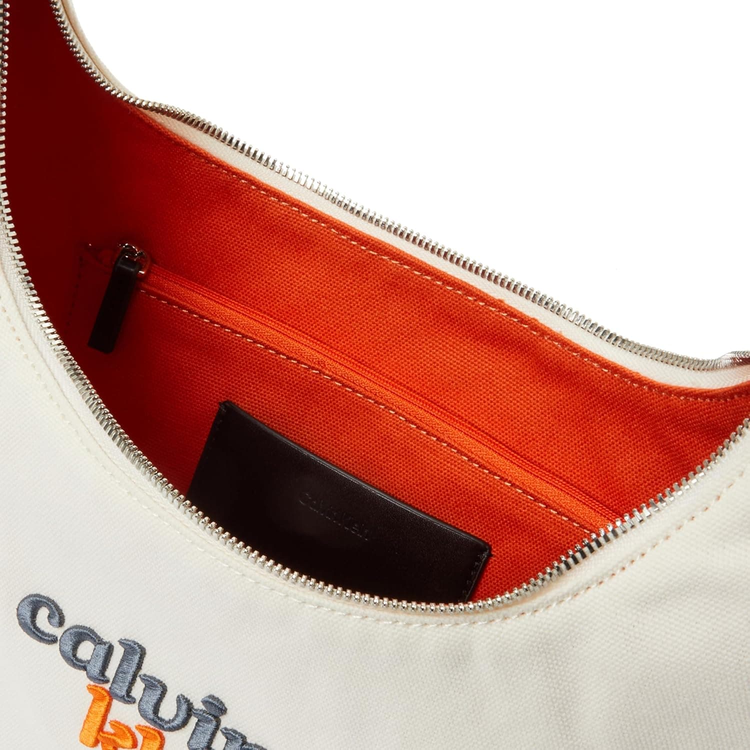 کیف دوشی زنانه Calvin Klein سفید مدل GRAPHIC CANVAS MEDIUM SHOULDER B کیف دوشی زنانه Calvin Klein سفید مدل GRAPHIC CANVAS MEDIUM SHOULDER B