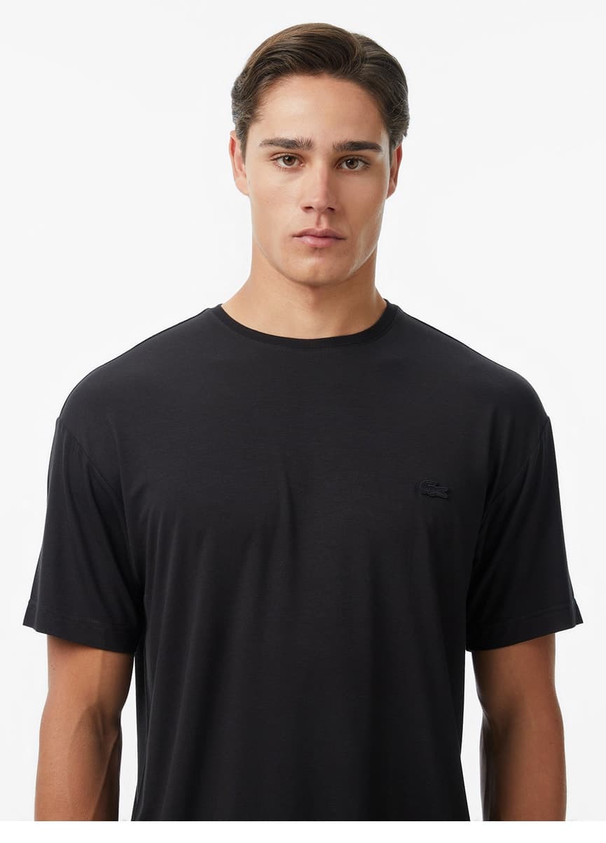 تیشرت مردانه Lacoste یقهگرد فیت آزاد مشکی تیشرت مردانه Lacoste یقهگرد فیت آزاد مشکی