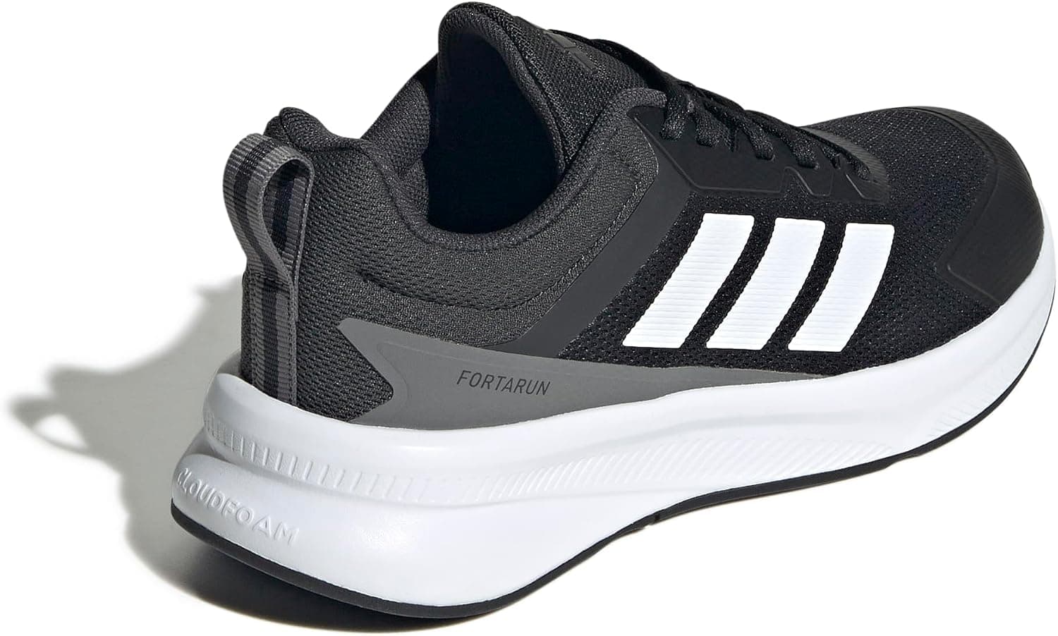 کفش بچگانه یونیسکس adidas مدل FortaRun 4.0 J با زیره کوتاه، مشکی/سفید/ذغالی، 37 1/3 کفش بچگانه یونیسکس adidas مدل FortaRun 4.0 J با زیره کوتاه، مشکی/سفید/ذغالی، 37 1/3