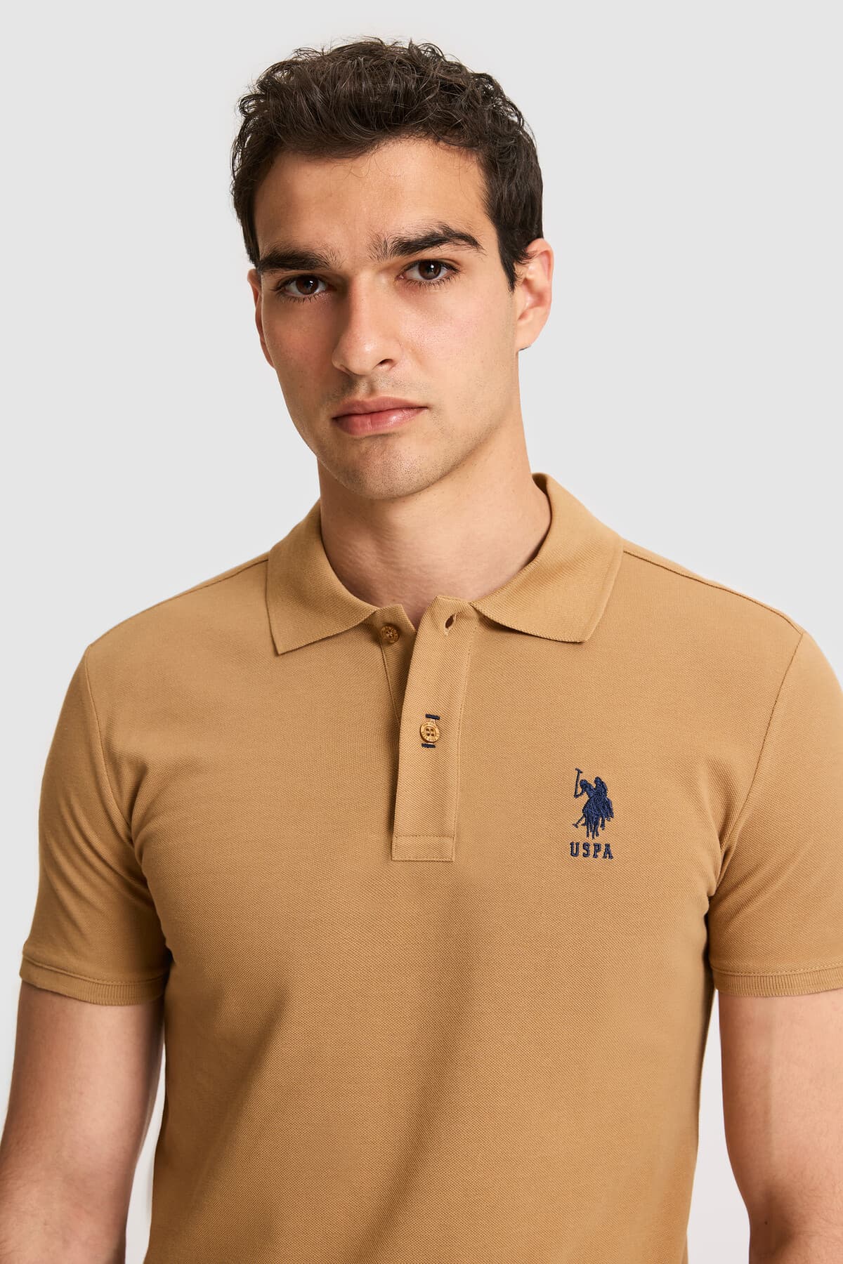 تیشرت مردانه U.S. Polo Assn. یقه پولو فیت اسلیم بیسیک نارگیلی مدل 50326920-VR153 تیشرت مردانه U.S. Polo Assn. یقه پولو فیت اسلیم بیسیک نارگیلی مدل 50326920-VR153
